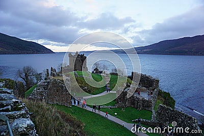 Aerial shot of the ruins of Urquhart Castle, Edinburgh under cloudy sky Editorial Stock Photo