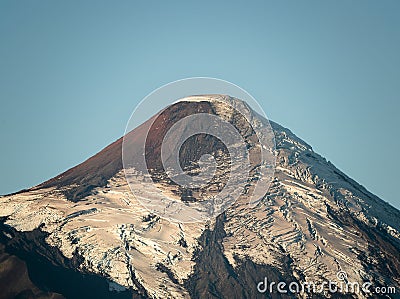 Aerial shot of the top of the Osorno volcano with its partially thawed glacier, Chile. Stock Photo