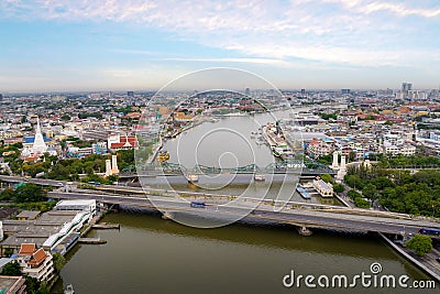 Aerial shots taken from a drone of Phra Pok Klao Bridge and Phra Phuttha Yot Fa Bridge. crossing the Chao Phraya River in the Stock Photo