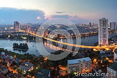 Aerial skyline view of Hanoi at Linh Dam lake, Belt Road No. 3. Hanoi cityscape by sunset period Stock Photo