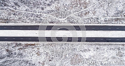 Aerial snowy view countryside winter road track Stock Photo