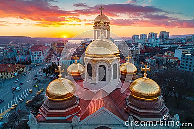 Aerial sunset view of The Cathedral of the Assumption and sea in Varna city, Bulgaria Editorial Stock Photo