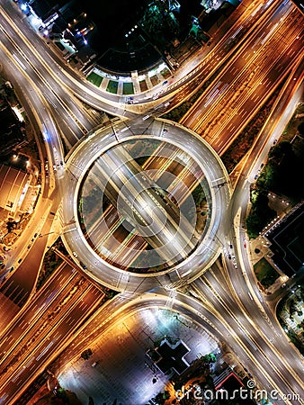 Aerial top down night view of a multilevel junction highway Stock Photo