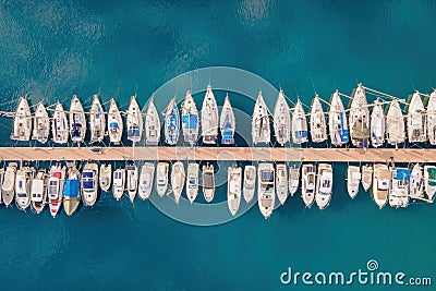 Aerial top-down view of docked sailboats Stock Photo