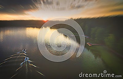 Aerial top down view of lake Baltieji Lakajai coast with boats and forest in Labanoras regional park, Moletai, Lithuania Stock Photo