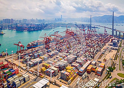 Aerial top view of container cargo ship in the export and import business and logistics international goods in urban city. Stock Photo