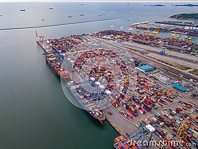 Aerial top view of container cargo ship in the export and import business and logistics international goods in urban city. Editorial Stock Photo