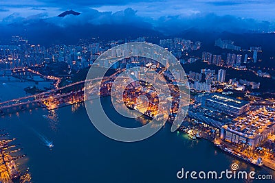 Aerial top view of container cargo ship in the export and import business and logistics international goods in urban city. Stock Photo