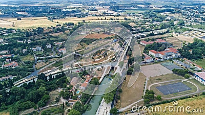 Aerial top view of Fonserannes locks on canal du Midi from above, unesco heritage landmark, France Stock Photo