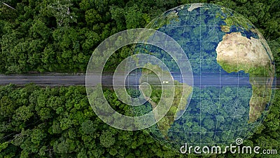 Aerial top view of green electric vehicle car driving over straight forest road, EV car electric vihicle car on forest road with Stock Photo