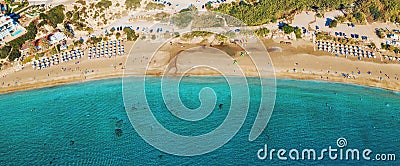 Aerial top view panorama of beautiful Coral beach in Paphos with azure seawater, Cyprus. Sand coast with umbrellas Stock Photo
