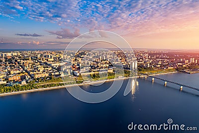 Aerial top view panorama city Perm and central embankment of Kama river Russia, sunset drone photo Stock Photo