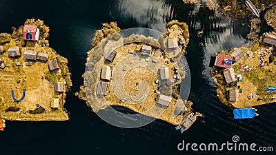 Aerial top view photo of floating islands on Lake Titicaca in Peru Stock Photo