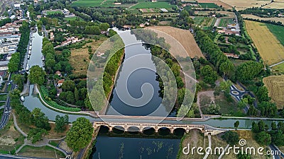 Aerial top view of river, canal du Midi and bridges from above, Beziers town in South France Stock Photo
