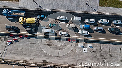 Aerial top view of road automobile traffic jam of many cars from above, block and road repair, city transportation Editorial Stock Photo
