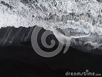 Aerial top view of wave of Black Sand Beach Reynisfjara in Iceland Stock Photo