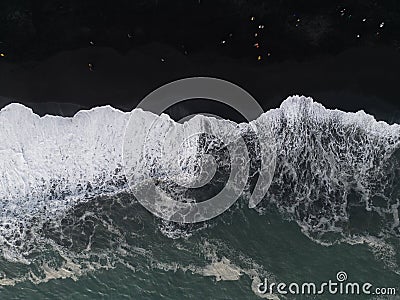 Aerial top view of wave of Black Sand Beach Reynisfjara in Iceland Stock Photo
