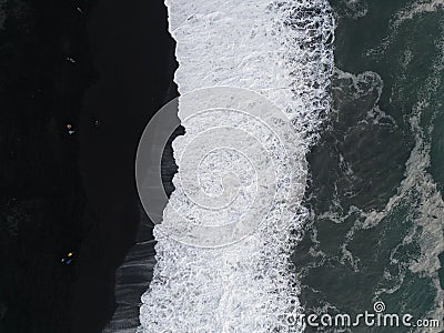 Aerial top view of wave of Black Sand Beach Reynisfjara in Iceland Stock Photo