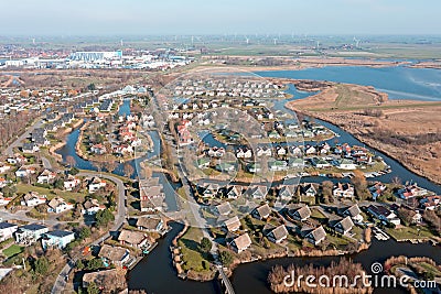 Aerial from a typical dutch landscape: houses and water in Friesland the Netherlands Stock Photo