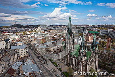 Aerial veiw on Elizabeth church in Lviv, Ukraine from drone. Consecration of Easter food, cakes, eggs Stock Photo