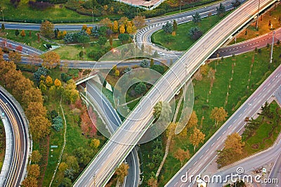 Aerial View Above of Highway Road Junctions at Sunset. The Intersecting Freeway Road Overpass. Istanbul Stock Photo