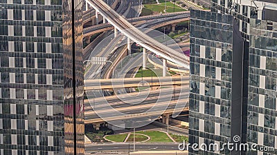 Aerial view from above to a busy road intersection in Dubai timelapse. Editorial Stock Photo