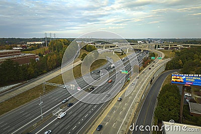 Aerial view of american freeway intersection with fast moving cars and trucks. USA transportation infrastructure concept Editorial Stock Photo