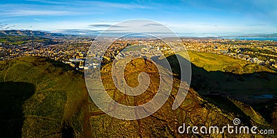 Aerial view of Arthurs seat with the Old city of Edinburgh on the background Stock Photo