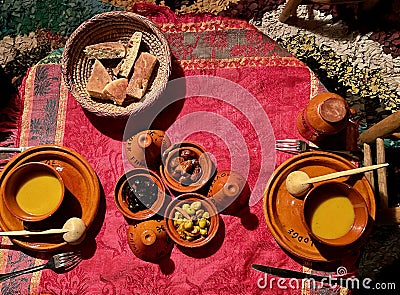 Aerial view of authentic Moroccan dinner at Berber homestay in the High Atlas Mountains. Imlil valley, Morocco. Stock Photo