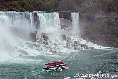 Aerial view of beautiful cruise ships with mesmerizing Niagara Falls waterfall in the background Editorial Stock Photo