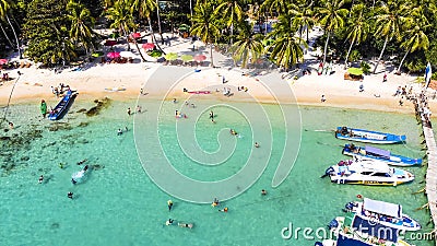 Aerial view of beautiful landscape, tourism boats, and people swimming on the sea and beach on May Rut island (a tranquil island Editorial Stock Photo