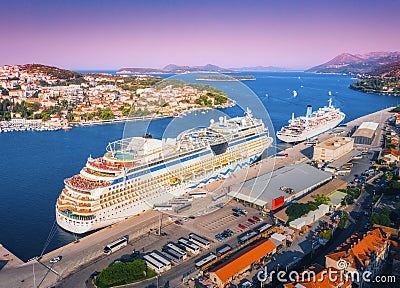 Aerial view of beautiful large white cruise ships at sunset Stock Photo