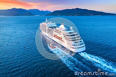 Aerial view of beautiful large white ship at sunset Stock Photo