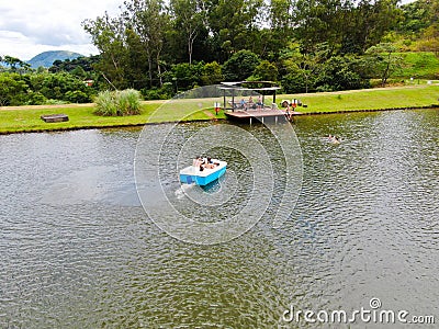 Aerial view of beautiful little wood cabana next the lake in tropical mountain, Editorial Stock Photo