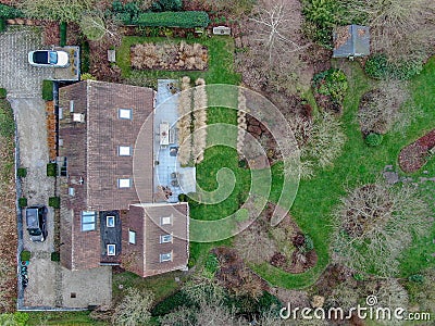 Aerial view of beautiful luxury villa with english garden type during winter season. Editorial Stock Photo