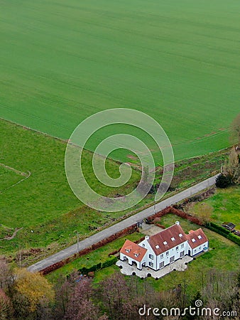 Aerial view of beautiful luxury villa with farmland around during winter season. Editorial Stock Photo