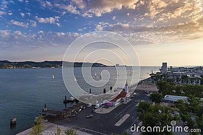 Aerial view of the BelÃ©m neighbourhood in the city of Lisbon with sail boats on the Tagus River at sunset; Editorial Stock Photo