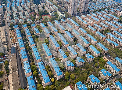 Aerial view of blue houses. Residential neighborhood. Urban housing development from above. Top view. Real estate in Shanghai City Stock Photo