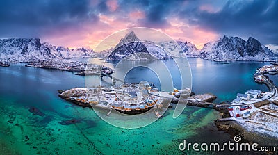 Aerial view of blue sea, snowy mountains, rocks, village Stock Photo