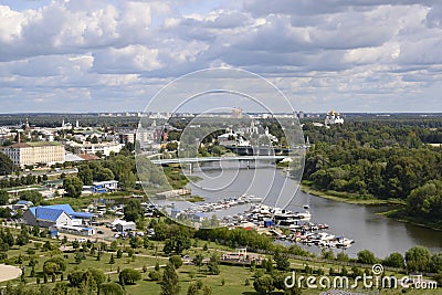 Aerial view of the bridge over the Kotorosl River, a boat dock, a park and buildings from different centuries in Yaroslavl, Russia Stock Photo