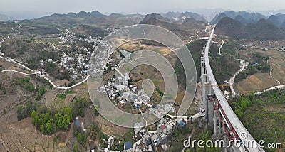 Aerial view of bridge and remote village in Guizhou, China Stock Photo