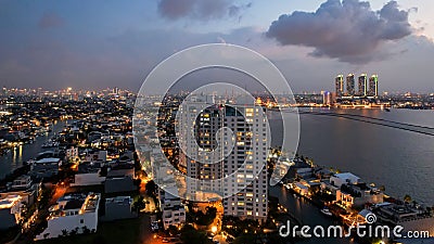 Aerial view of the Bright spring cityscape of Pluit port. Colorful sunset view of Jakarta, Indonesia. Beautiful Jakarta seascape. Editorial Stock Photo