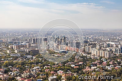 Aerial view of the business center of the city of Almaty surrounded by summer greenery Editorial Stock Photo