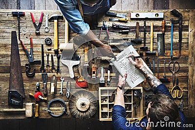 Aerial view of carpenter man listing checking tools equipment Stock Photo