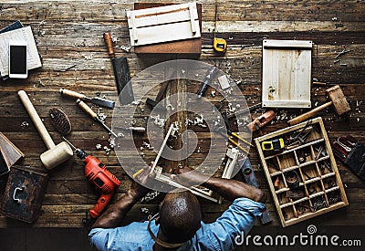 Aerial view of carpenter man working with tools equipment set Stock Photo