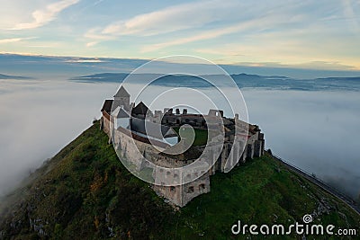 Aerial view about castle of Sumeg with foggy sunrise at the background. Stock Photo
