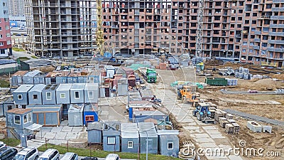 Aerial view of change houses for workers at construcrion area with concrete and construction materials Editorial Stock Photo