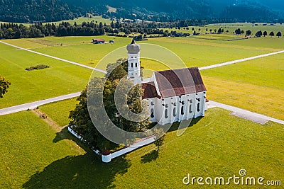 Aerial view of church near Schwangau with Alps in background Stock Photo