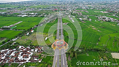 Aerial view of the city colorful Monument Tembolak Rainbow and Mataram City metro monument. The newest icon from the city of Editorial Stock Photo