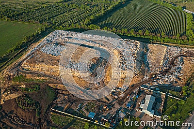 Aerial view of city garbage dump. Pile of plastic trash, food waste, landfill. Pollution concept Stock Photo